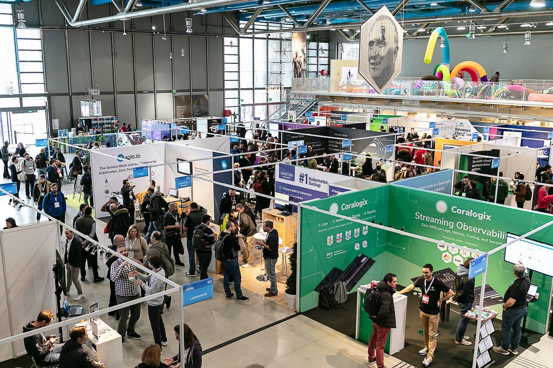 Partner sponsor booth staffed by two hosts, KCD signage visible